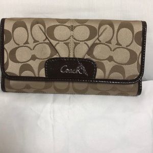 Brown and Tan C patterned  Coach wallet